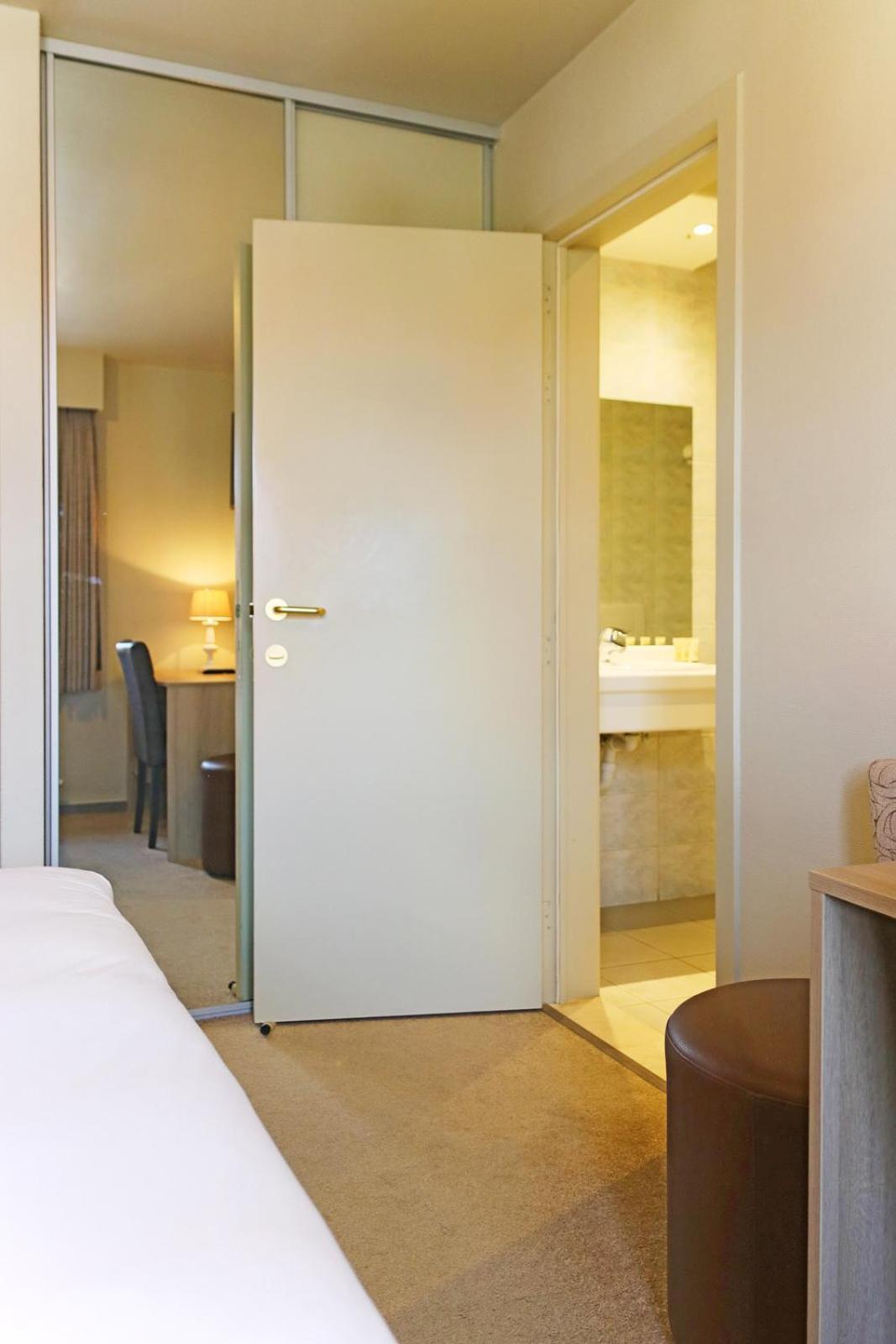 Hotel Les Dunes De Haan Habitación foto